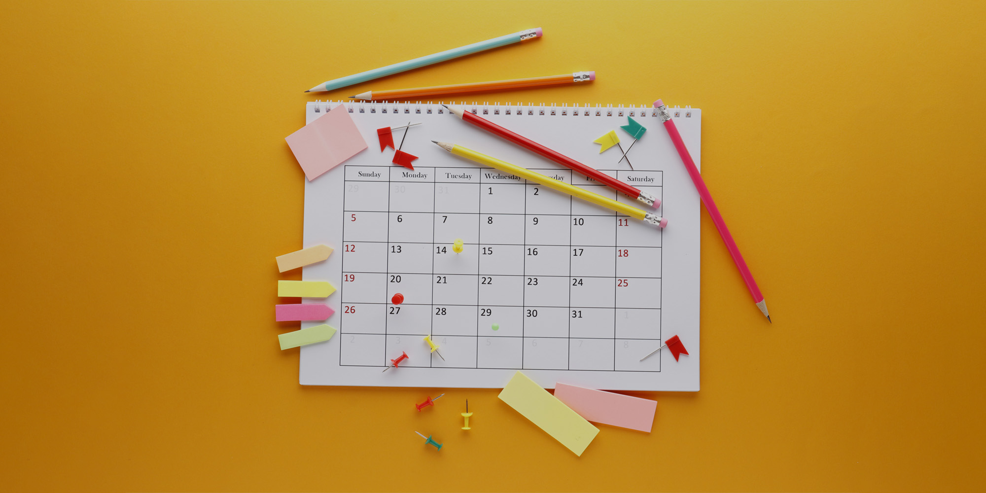Calendar with pencils on it